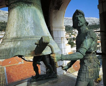 'Green Men' ringing the bell, Dubrovnik
